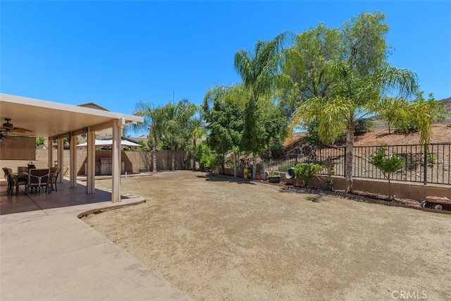 31676 Brentworth St, Menifee, CA 92584 - fenced backyard featuring ceiling fan and a patio