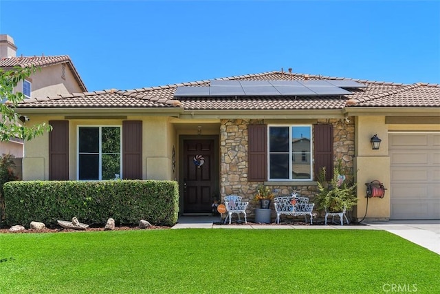 31676 Brentworth St, Menifee, CA 92584 - view of front facade featuring a front lawn, solar panels, and a tiled roof