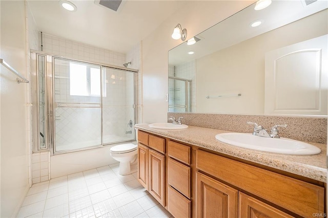 16714 Inglewood Ave Unit A, Lawndale, CA 90260 - bathroom featuring bath / shower combo with glass door, tile patterned floors, double vanity, and recessed lighting