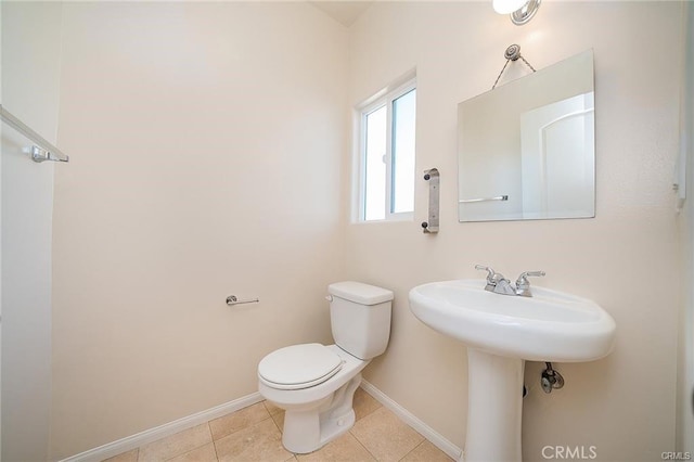 16714 Inglewood Ave Unit A, Lawndale, CA 90260 - half bath featuring toilet and tile patterned floors