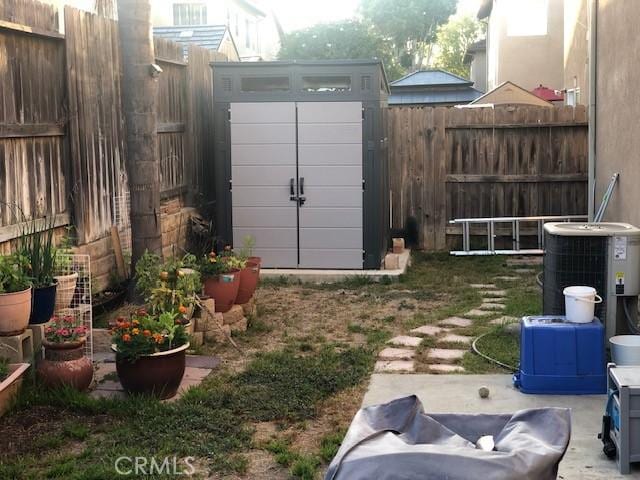 2237 Pajaro St, Oxnard, CA 93030 - view of yard featuring a storage unit