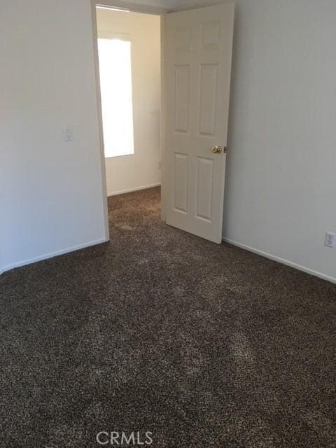 2237 Pajaro St, Oxnard, CA 93030 - empty room with carpet flooring and baseboards