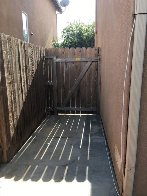2237 Pajaro St, Oxnard, CA 93030 - view of vehicle parking featuring a gate