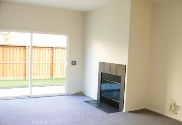 2237 Pajaro St, Oxnard, CA 93030 - unfurnished living room with carpet floors and a tile fireplace