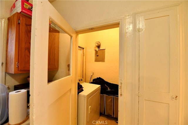 3945 Woolwine Dr, Los Angeles, CA 90063 - laundry room featuring washer / clothes dryer, electric panel, and cabinet space