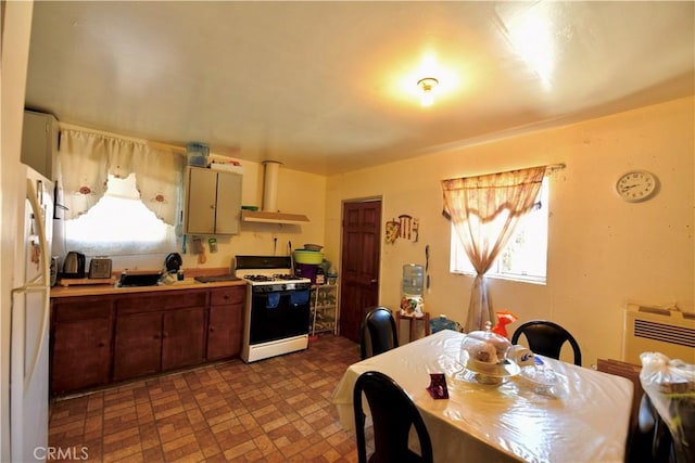 3945 Woolwine Dr, Los Angeles, CA 90063 - kitchen featuring white gas range oven and light countertops