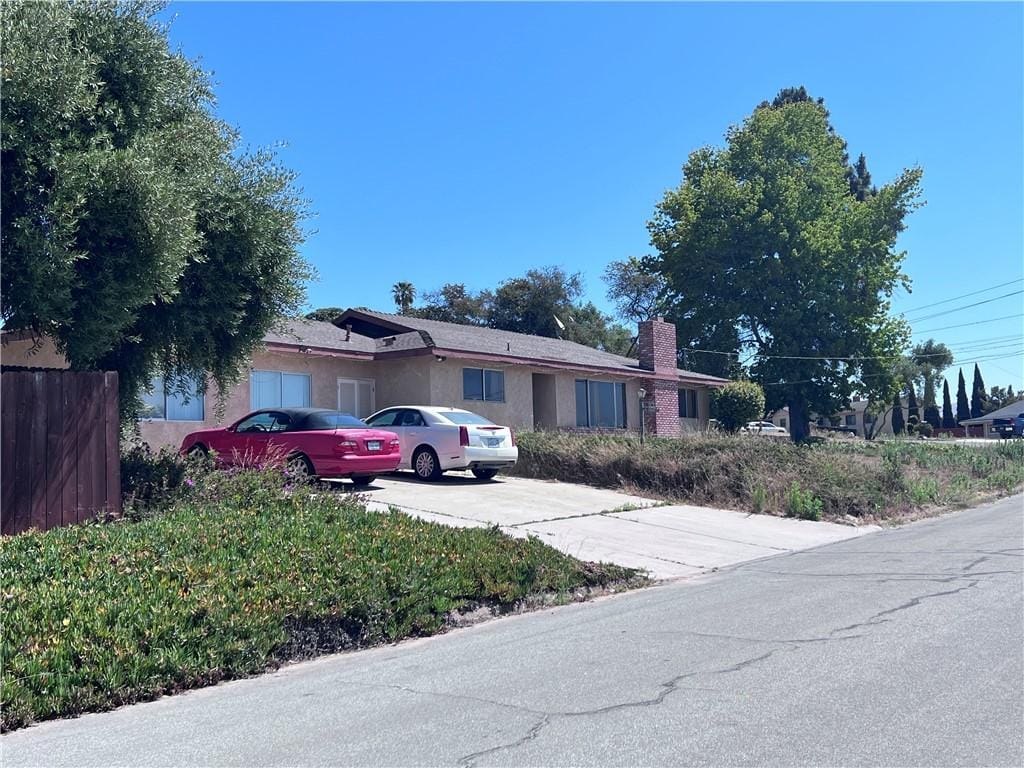 777 Sierra Rd, Nipomo, CA 93444 - view of front of property with a chimney and driveway