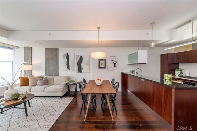 1155 S Grand Ave Unit 1008, Los Angeles, CA 90015 - dining room with dark wood-style floors