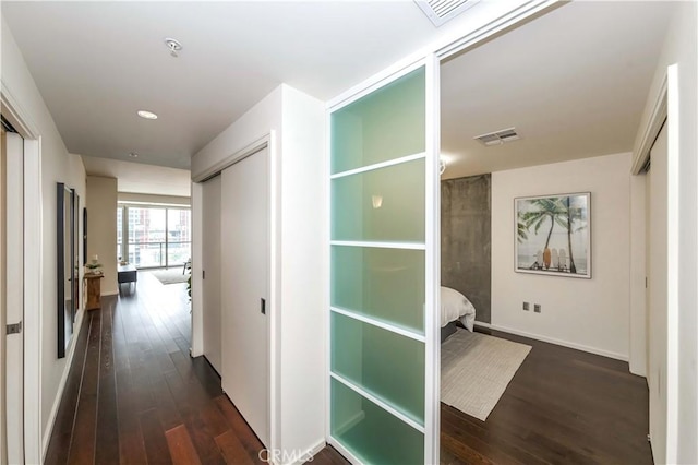 1155 S Grand Ave Unit 1008, Los Angeles, CA 90015 - corridor featuring dark wood-style floors and recessed lighting