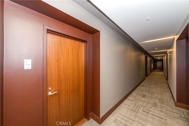 1155 S Grand Ave Unit 1008, Los Angeles, CA 90015 - hall with baseboards and light colored carpet