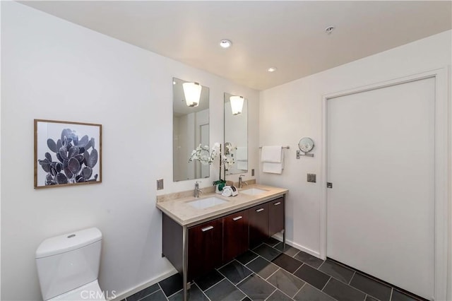1155 S Grand Ave Unit 1008, Los Angeles, CA 90015 - full bathroom with double vanity, tile patterned floors, and recessed lighting