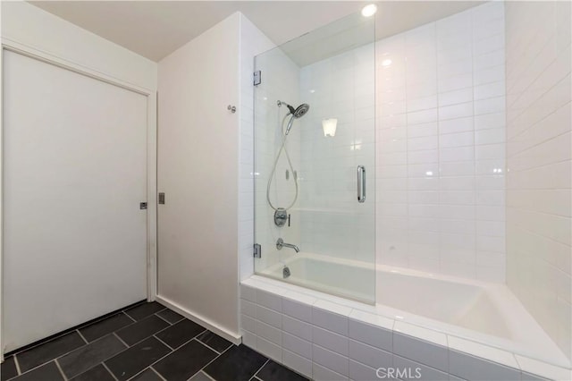 1155 S Grand Ave Unit 1008, Los Angeles, CA 90015 - bathroom with tiled shower / bath and tile patterned floors