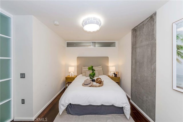1155 S Grand Ave Unit 1008, Los Angeles, CA 90015 - bedroom featuring wood finished floors and baseboards
