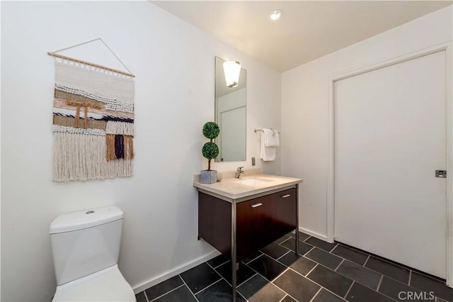 1155 S Grand Ave Unit 1008, Los Angeles, CA 90015 - bathroom featuring vanity, tile patterned flooring, and recessed lighting