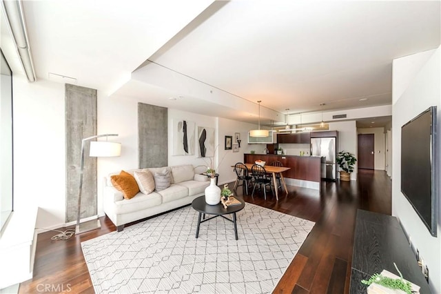 1155 S Grand Ave Unit 1008, Los Angeles, CA 90015 - living area featuring dark wood-type flooring and baseboards