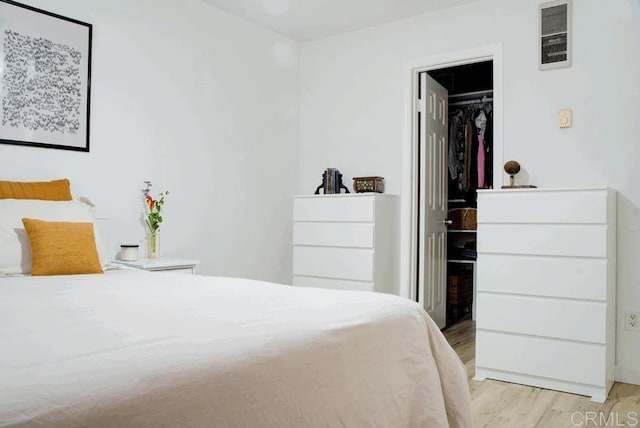 2041 E Grand Ave E Unit 3, Escondido, CA 92027 - bedroom featuring light wood-style floors and a walk in closet