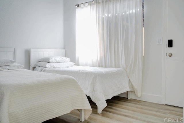 2041 E Grand Ave E Unit 3, Escondido, CA 92027 - bedroom featuring light wood-style floors