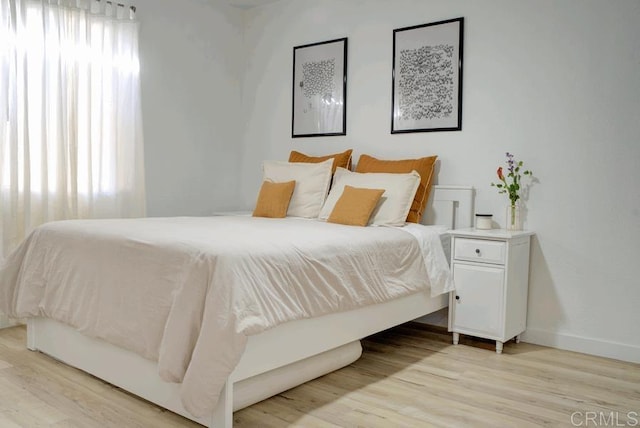 2041 E Grand Ave E Unit 3, Escondido, CA 92027 - bedroom with multiple windows and light wood-type flooring