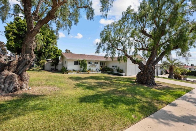 102 Sierra Way, Chula Vista, CA 91911 - single story home featuring a front lawn and a garage