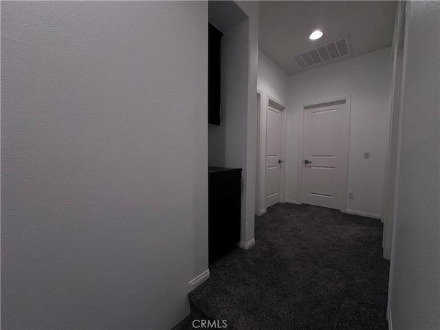 58 Origin, Irvine, CA 92618 - hall featuring dark carpet and baseboards