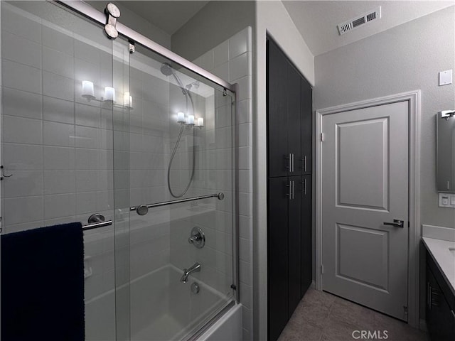 58 Origin, Irvine, CA 92618 - full bath featuring bath / shower combo with glass door, vanity, and tile patterned flooring