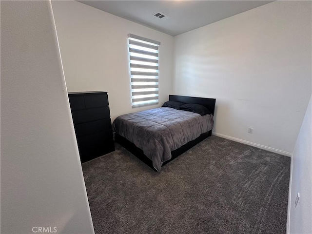 58 Origin, Irvine, CA 92618 - bedroom featuring dark carpet and baseboards