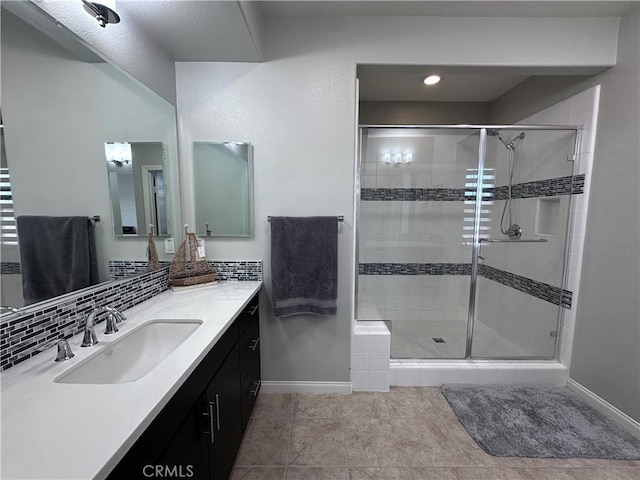 58 Origin, Irvine, CA 92618 - full bath featuring a stall shower, vanity, tile patterned floors, and recessed lighting