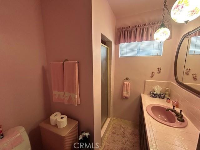 1220 W L St, Wilmington, CA 90744 - full bath with plenty of natural light, vanity, and a stall shower