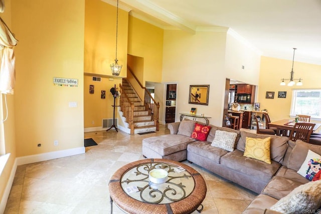 1560 Cavernt Pt, Chula Vista, CA 91911 - living area featuring a chandelier, stairs, and crown molding