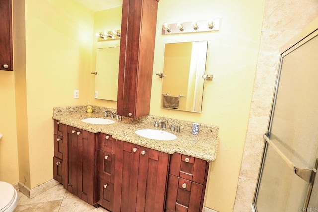 1560 Cavernt Pt, Chula Vista, CA 91911 - full bathroom with double vanity, a shower with shower door, and tile patterned flooring