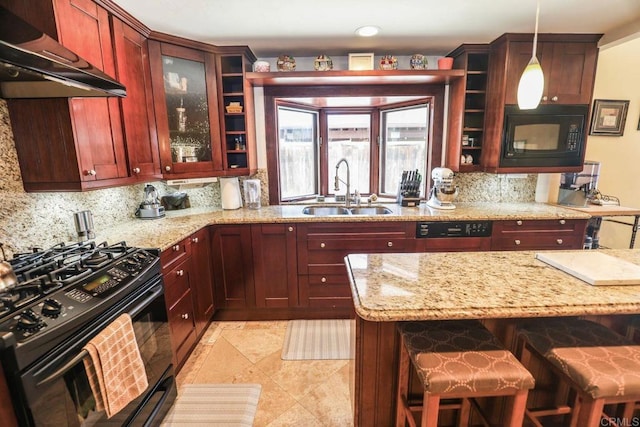 1560 Cavernt Pt, Chula Vista, CA 91911 - kitchen with black appliances, range hood, dark brown cabinets, and backsplash