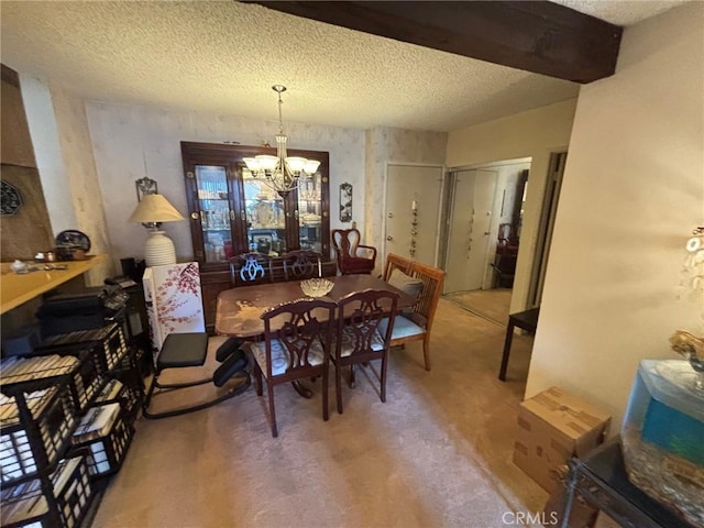 550 W Regent St Unit 338, Inglewood, CA 90301 - dining room featuring a chandelier and a textured ceiling