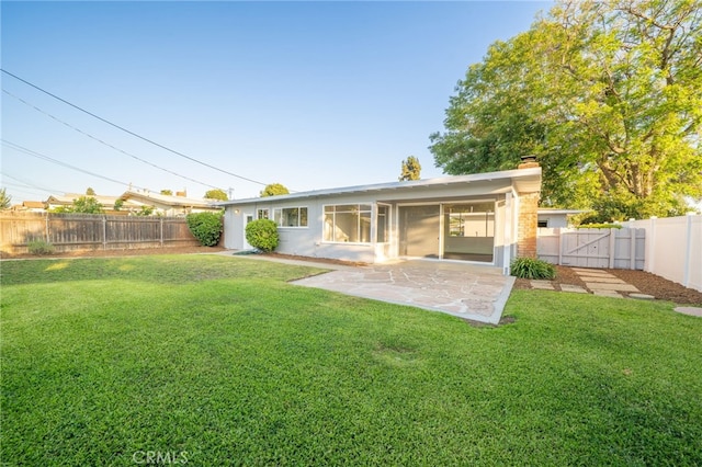 817 W Hollyvale St, Glendora, CA 91740 - back of property with a patio, a fenced backyard, a chimney, and stucco siding