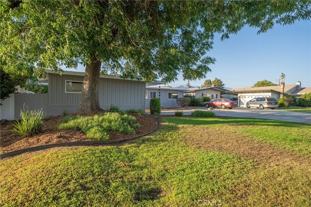817 W Hollyvale St, Glendora, CA 91740 - single story home featuring a front lawn and board and batten siding