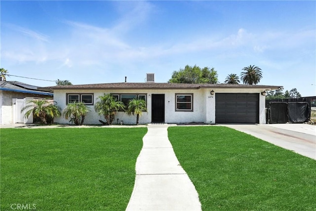 16874 Athol St, Fontana, CA 92335 - ranch-style house with stucco siding, a garage, and driveway