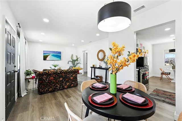 16874 Athol St, Fontana, CA 92335 - dining room featuring wood finished floors and recessed lighting