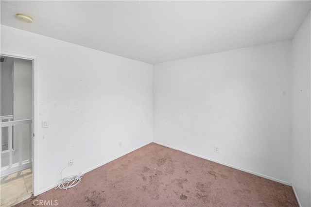 15372 Brandon Ln, Fontana, CA 92337 - spare room featuring carpet flooring and a smoke detector