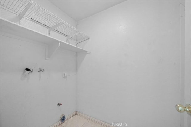 15372 Brandon Ln, Fontana, CA 92337 - washroom featuring gas dryer hookup and tile patterned floors