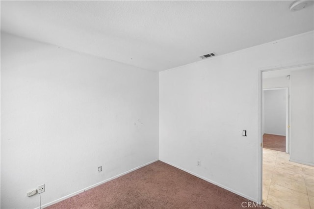 15372 Brandon Ln, Fontana, CA 92337 - unfurnished room featuring baseboards and light colored carpet