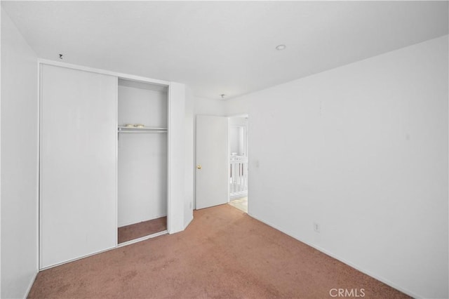 15372 Brandon Ln, Fontana, CA 92337 - unfurnished bedroom with carpet flooring and a closet