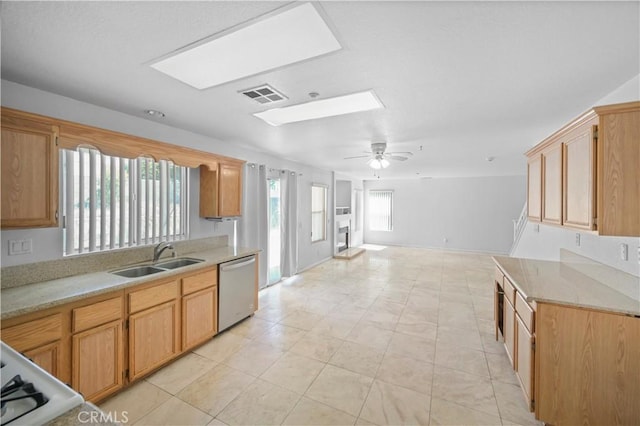 15372 Brandon Ln, Fontana, CA 92337 - kitchen with a skylight, dishwasher, light countertops, and a ceiling fan