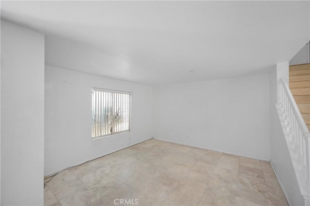 15372 Brandon Ln, Fontana, CA 92337 - empty room featuring stairway