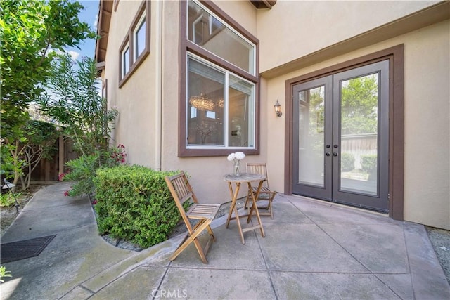 21 Dawnwood, Ladera Ranch, CA 92694 - entrance to property with french doors, stucco siding, and a patio area