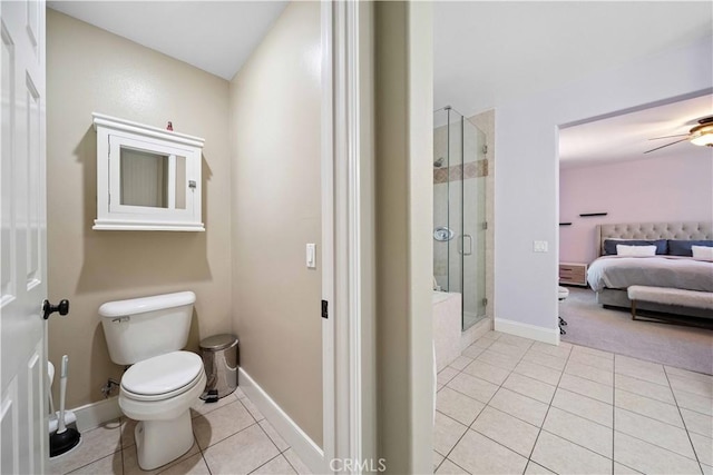 21 Dawnwood, Ladera Ranch, CA 92694 - ensuite bathroom featuring tile patterned flooring, a stall shower, ceiling fan, and a baseboard heating unit