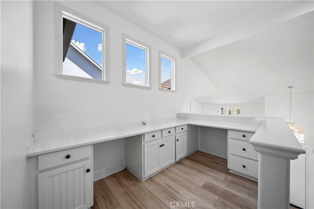 21 Dawnwood, Ladera Ranch, CA 92694 - unfurnished office with built in desk, light wood-style floors, and beamed ceiling
