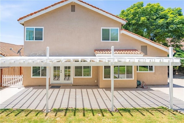 24046 Lindley St, Mission Viejo, CA 92691 - rear view of house featuring a pergola, a tiled roof, a patio area, and stucco siding