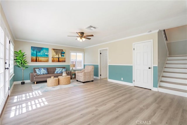 24046 Lindley St, Mission Viejo, CA 92691 - living area with stairs, a ceiling fan, ornamental molding, and light wood-type flooring