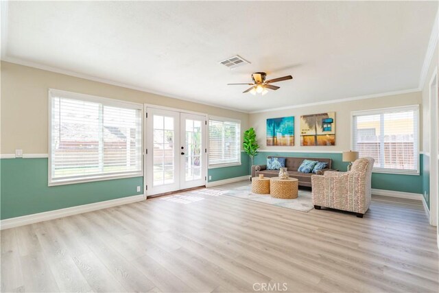 24046 Lindley St, Mission Viejo, CA 92691 - living area featuring ornamental molding, french doors, light wood-style floors, and a ceiling fan