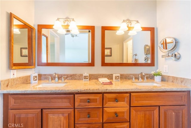 24046 Lindley St, Mission Viejo, CA 92691 - bathroom with a chandelier and double vanity