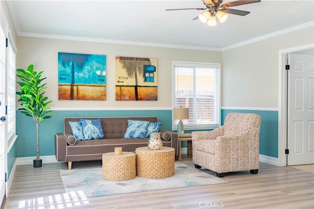 24046 Lindley St, Mission Viejo, CA 92691 - living room featuring ceiling fan, wood finished floors, and crown molding
